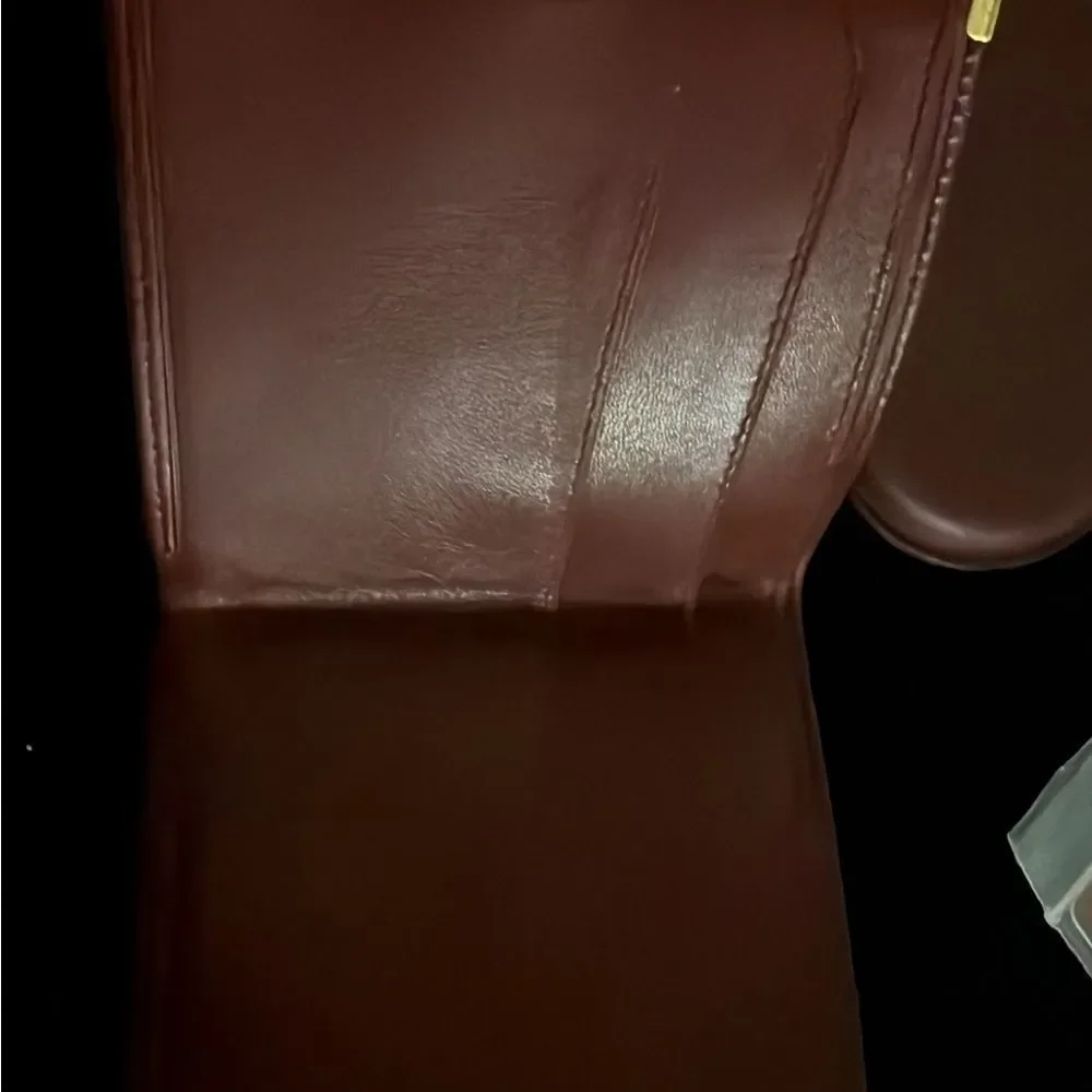 Never used Cartier red burgundy wallet comes with original box